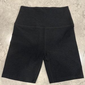 Women’s beyond yoga keep pace 5” space dye black biker shorts. UGC.